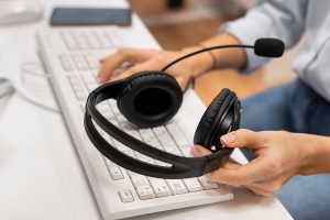 Answering service agent at keyboard